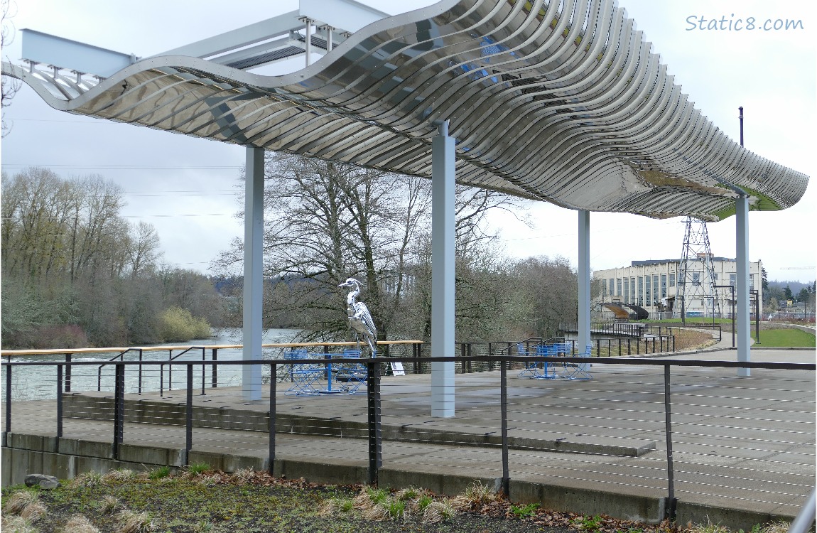 Heron statue and Art Pavillion, river and steam plant in the background