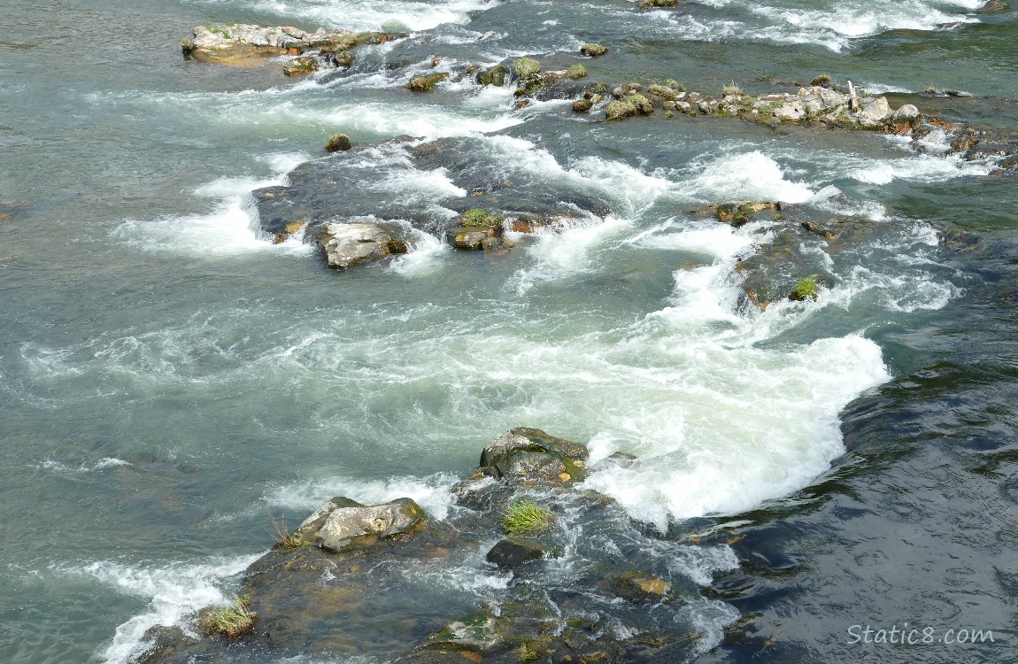 Water flowing around rocks