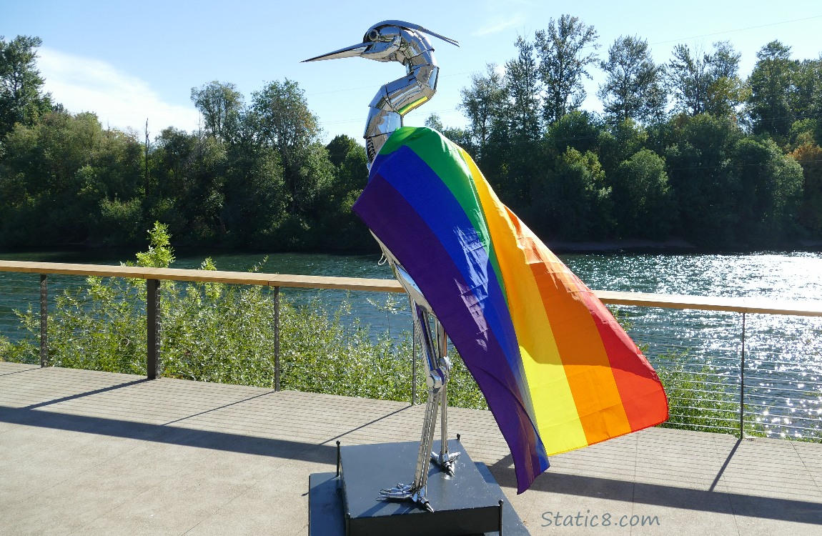 Heron sculpture, decorated with a Pride Flag