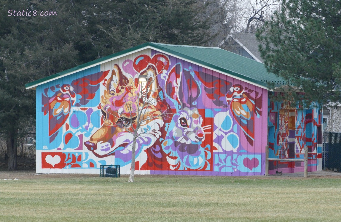 Fox and Hare mural on the side of a building