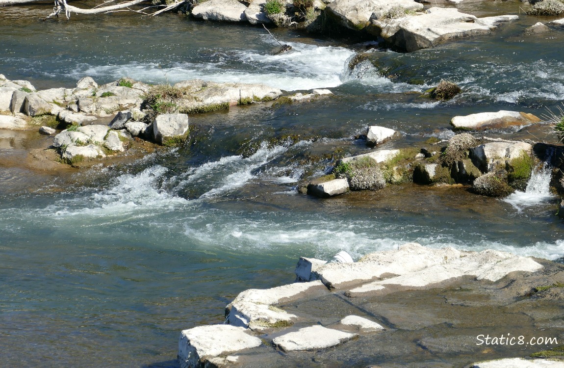 Looking down a the river going over rocks