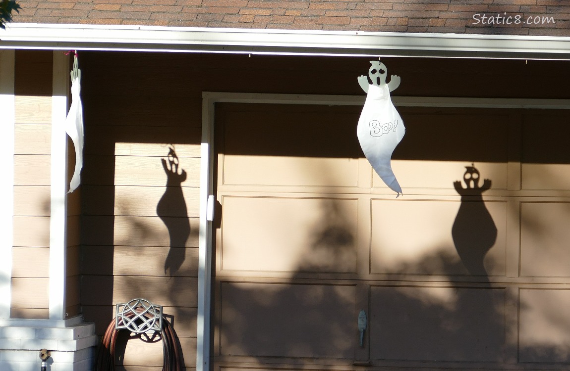 Halloween ghosts hanging from the eave