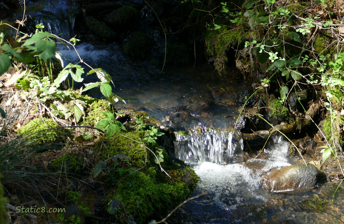 small waterfall in a lightbeam