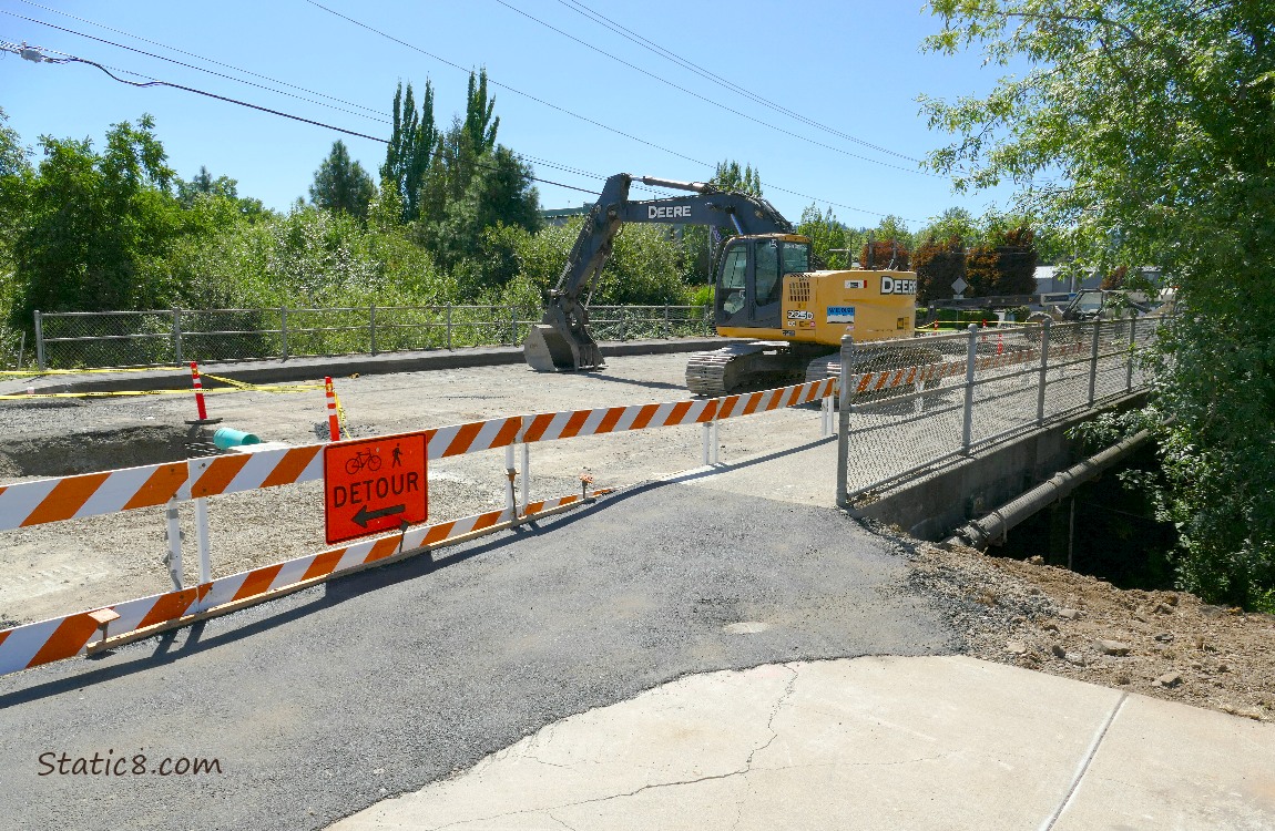 Construction on a road with a backhoe