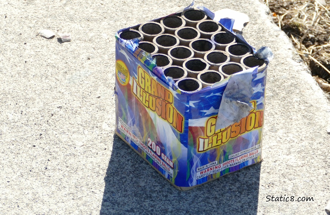 Empty firework container of Grand Illusion with flaming balls
