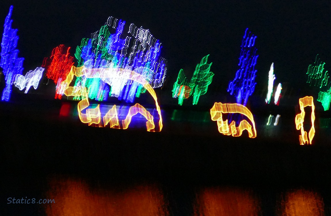 Blurry christmas light mama bear with cubs