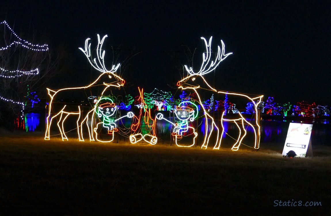 Neon light reindeers and elves