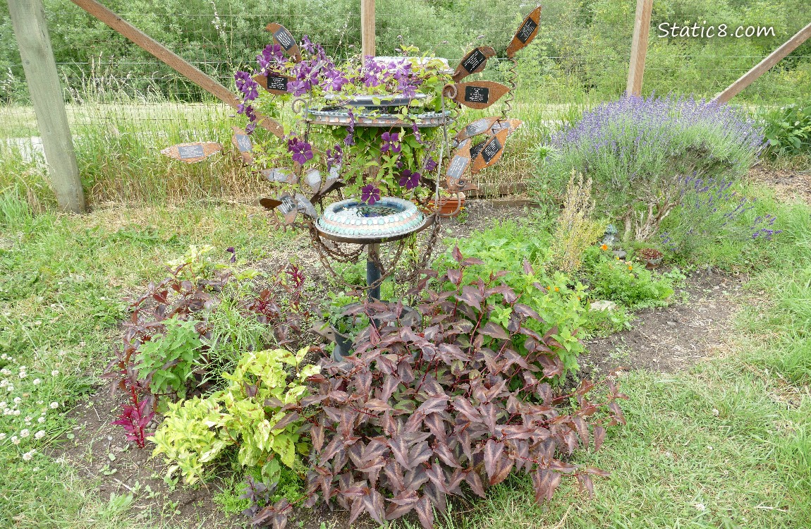 Art installation surrounded by flowers