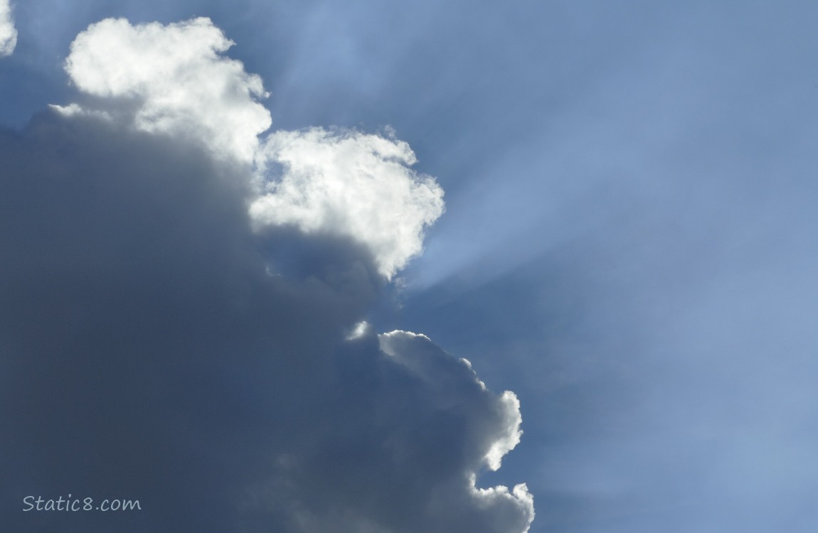 Sun rays coming out of clouds