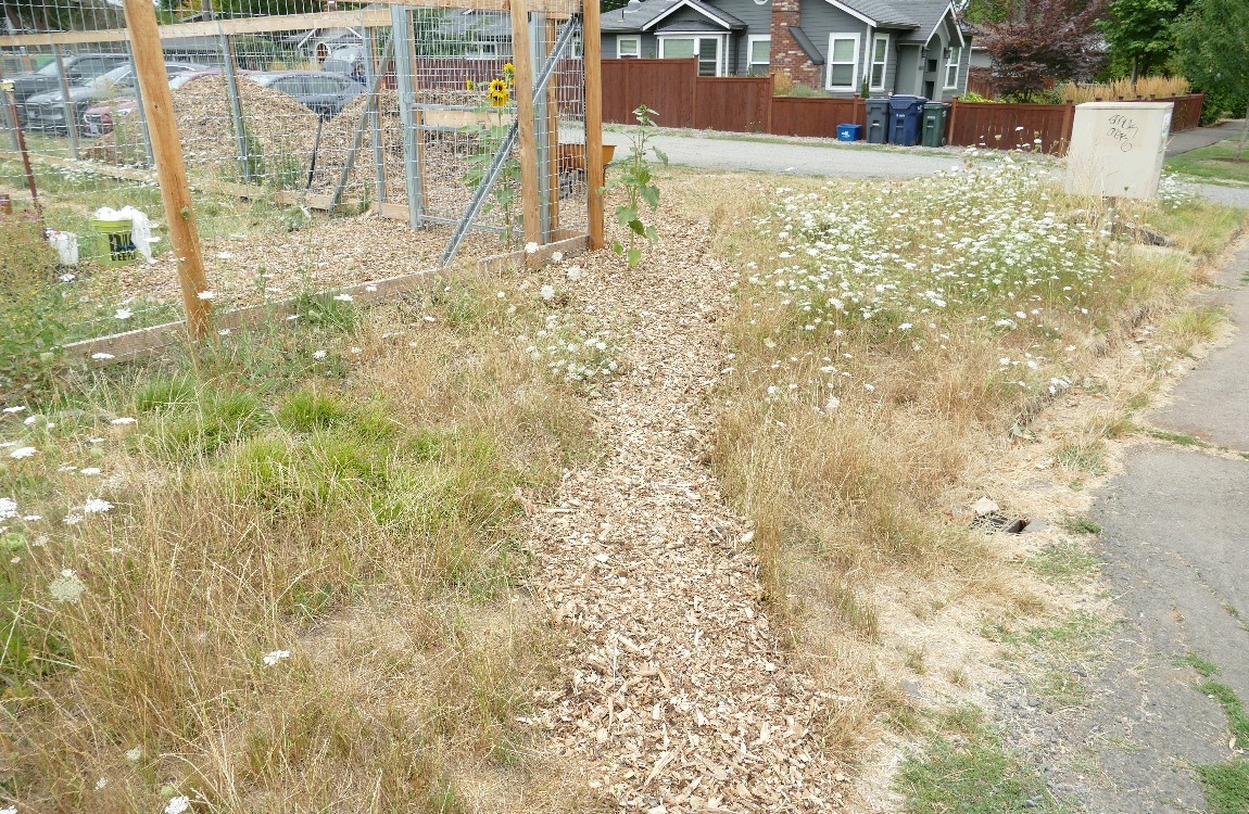 Wood chip path to a gate